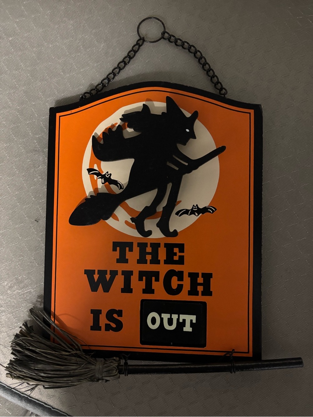 Orange 'The Witch Is Out' Halloween Wall Sign